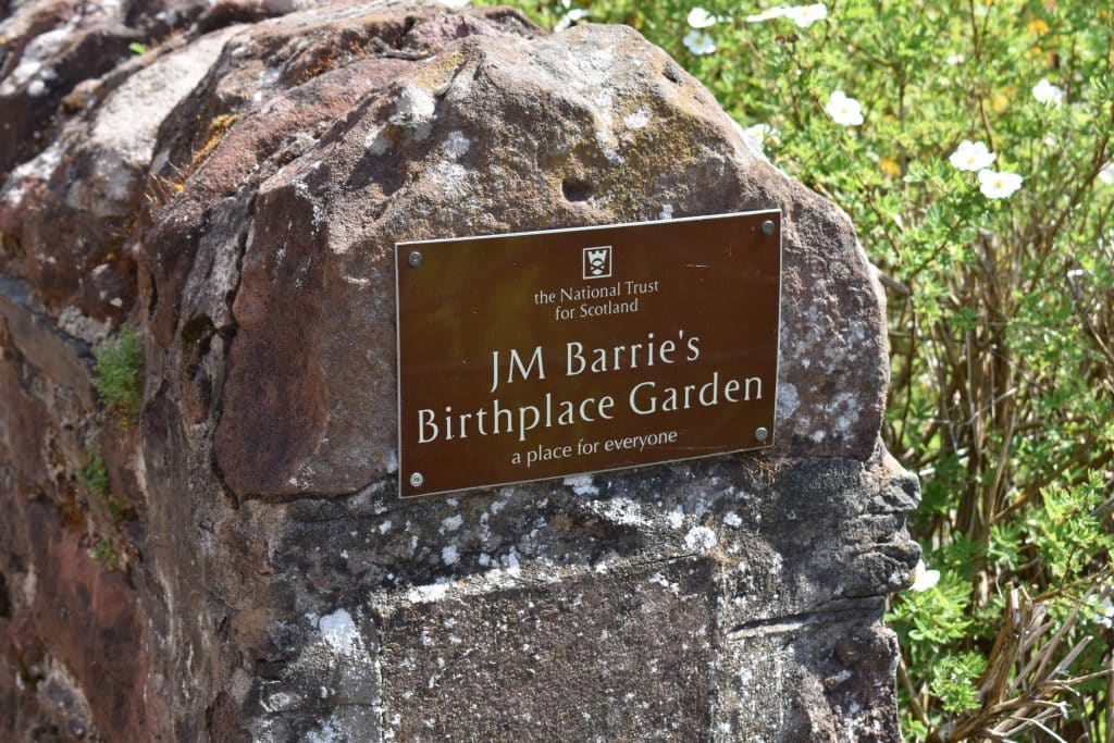 Stone with plaque indicating childhood home of J.M. Barrie